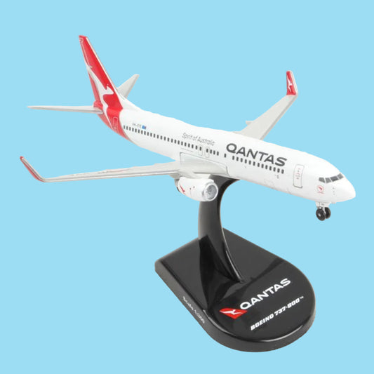 Connect with Australia's outback aviation heritage through this delightful 1/300 scale B737-8 from Postage Stamp, showcasing the Alice Springs special livery on Qantas aircraft VH-VYE. This beautifully crafted collectible honours the modern airliner that serves Australia's remote interior with pride and reliability, rendered with authentic detail and distinctive regional character. www.defenceqstore.com.au