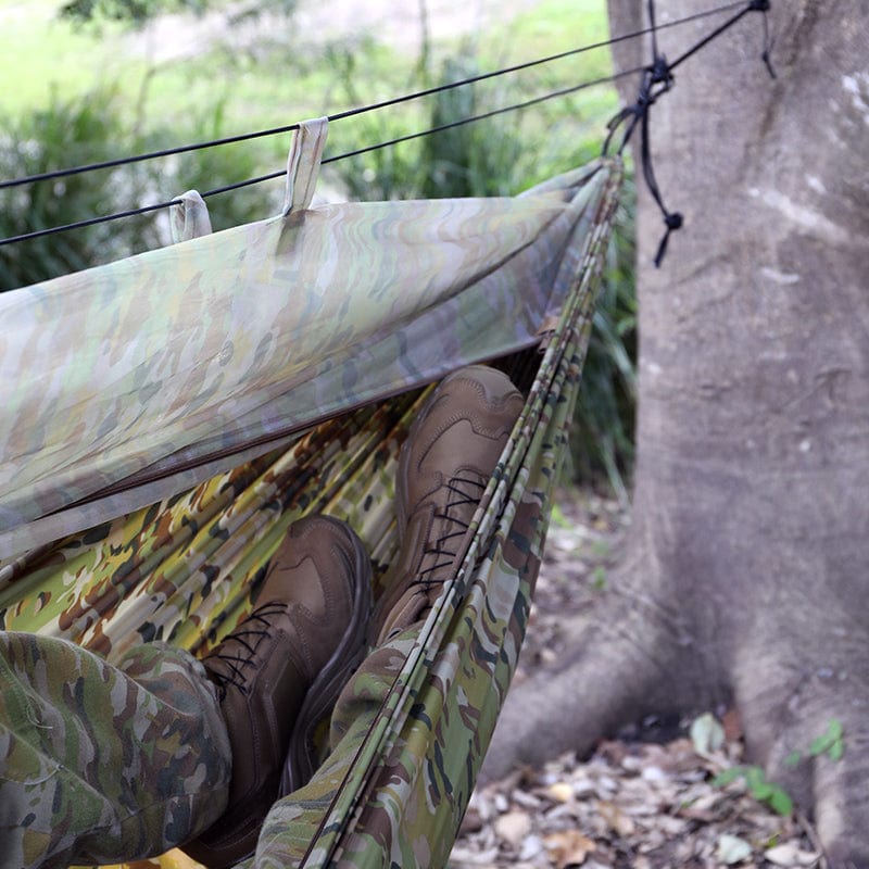 The Spartan Sleep Systems “Artemis Hammock” is an ultra-light hammock designed to keep the user off the ground and comfortable, whilst being completely enclosed in a bug netting. It enables interruption free sleep above the ground and from air attacks from bugs. www.defenceqstore.com.au
