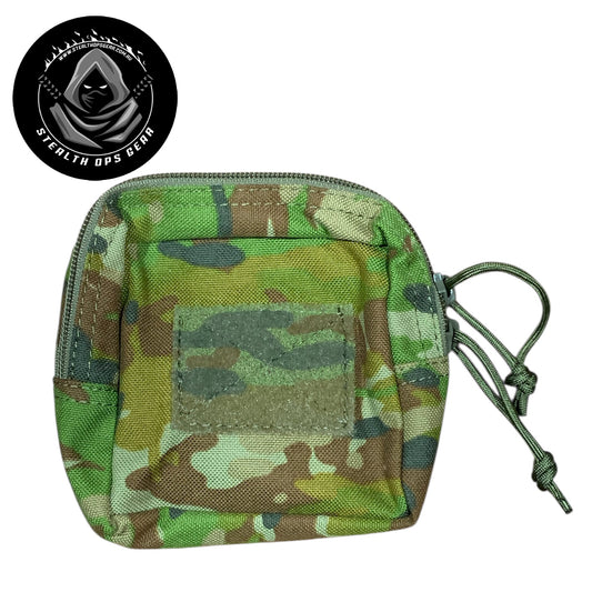 The AMCU Small Kit Pouch Stealth Ops Gear is an essential accessory for anyone needing quick access to small items without sacrificing space or comfort. Its compact dimensions of 12x11.5x6cm make it easy to attach to your belt, vest, or backpack without adding unnecessary bulk. www.defenceqstore.com.au