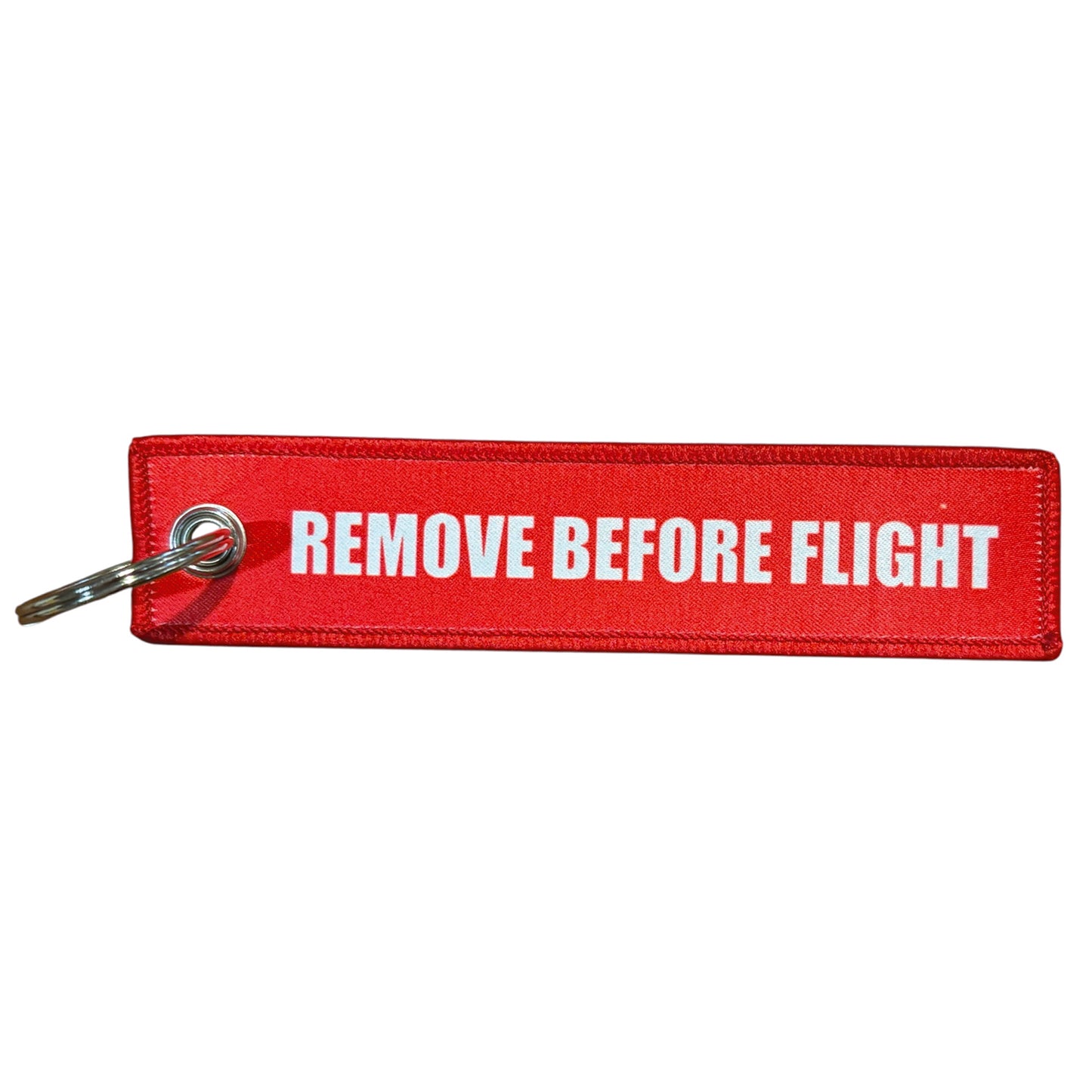 Keep your keys secure and add a touch of military pride with this authentic Air Force Key Tag. Featuring bold embroidered Air Force insignia and the iconic "Remove Before Flight" wording, it's a practical accessory that makes a statement. www.defenceqstore.com.au