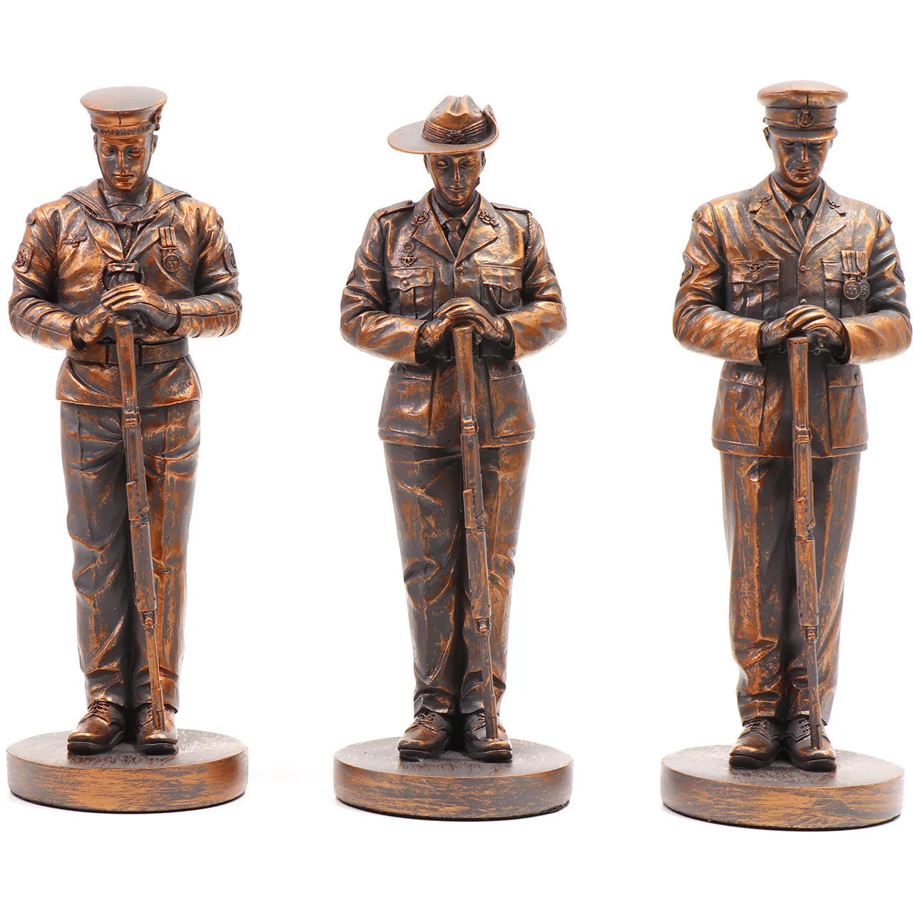 This stunning Courage, Honour, Sacrifice: We Will Remember Them* figurine is a remarkable tribute, crafted with exquisite attention to detail. The figurines, made from cold cast bronze, beautifully depict personnel from the Royal Australian Navy, Australian Army, and Royal Australian Air Force, all captured in a solemn Resting on Reversed Arms stance. www.defenceqstore.com.au