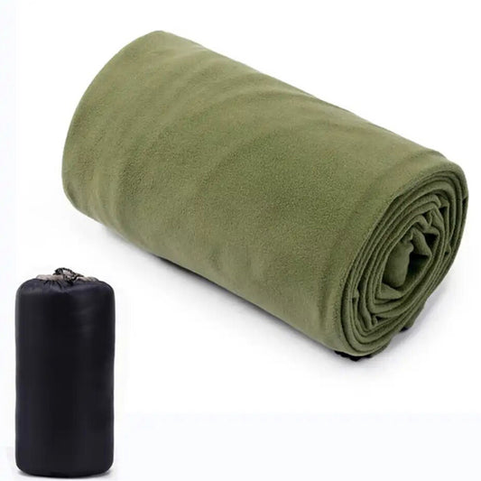 Enhance your outdoor adventures with this perfect Lightweight Fleece Liner for your sleeping bag. Its warm and cozy fleece lining guarantees a comfortable night's sleep even on a chilly night. Extend the life of your sleeping bag and add extra warmth with this liner - a smart investment for every trip! www.defenceqstore.com.au