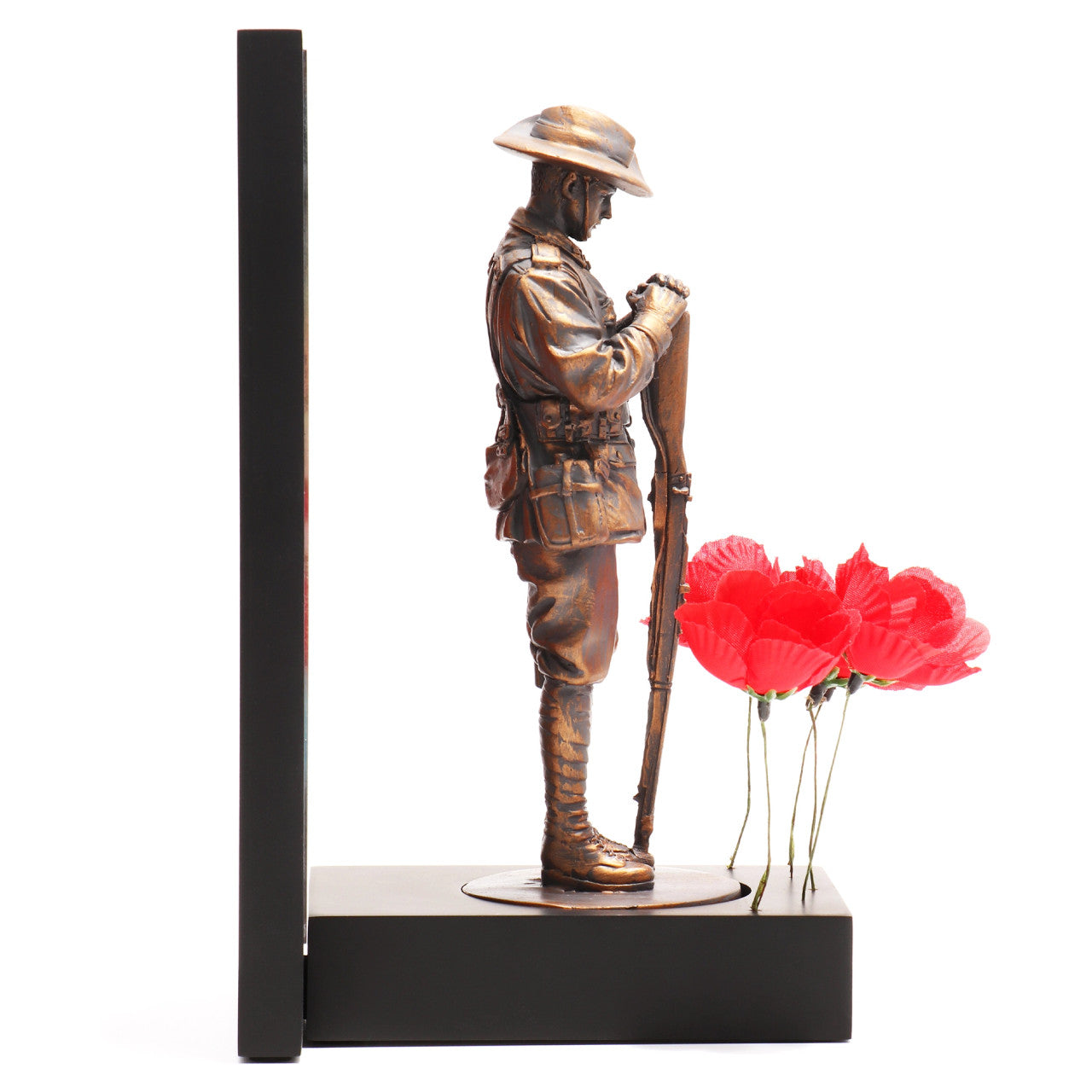 This beautifully crafted miniature figurine is a poignant tribute to our fallen soldiers. It comes with a striking acrylic backdrop, featuring an intricate stained-glass poppy design that adds depth and significance to the piece. www.defenceqstore.com.au