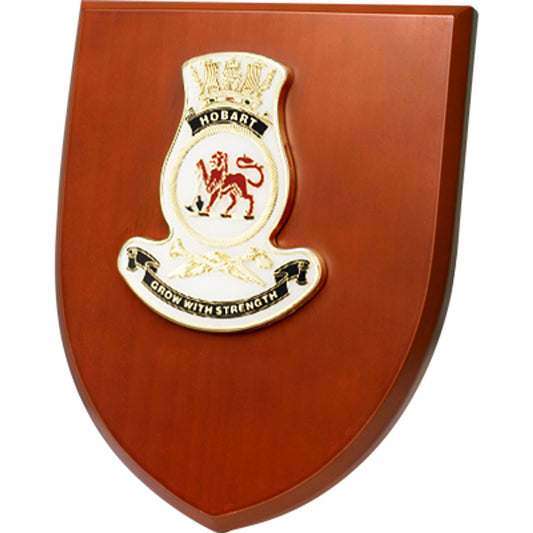 Celebrate the legacy of the HMAS Hobart with the beautifully crafted Shield Plaque. This striking plaque features a detailed representation of the ship’s insignia, offering a timeless tribute to its distinguished service and heritage. www.defenceqstore.com.au