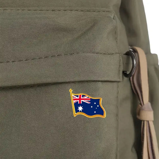 This gold-plated, enamel-filled lapel pin allows you to proudly display the Australian flag while honouring all those who have served or are currently serving in all theatres of war and peacekeeping efforts. Featuring the Australian Flag, it symbolises both national pride and remembrance. www.defenceqstore.com.au