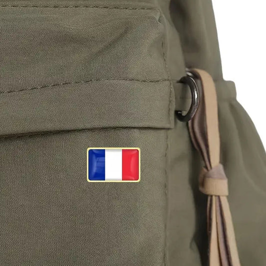 This gold-plated, enamel-filled lapel pin allows you to proudly display the French flag while honouring all those who have served or are currently serving in all theatres of war and peacekeeping efforts. Featuring the French Flag, it symbolises both national pride and remembrance. www.defenceqstore.com.au
