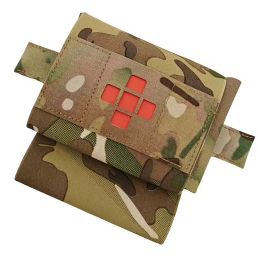 Compact yet comprehensive, this trauma first aid kit pouch combines tactical functionality with practical design. Weighing just 102 grams and measuring 22.5x10cm, it's engineered for rapid response without bulk. www.defenceqstore.com.au