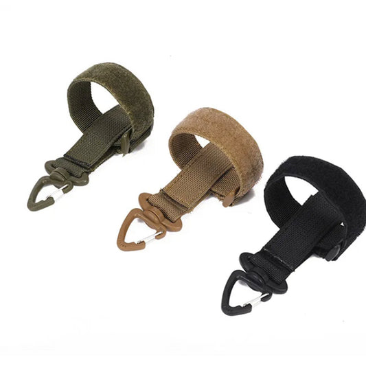 Experience superior strength and reliability with our Tactical Key & Gloves Holder MOLLE Webbing, crafted from high-quality nylon and reinforced with tight, durable stitching. The carabiner hook keychain securely attaches to casual and tactical belts up to two inches wide, giving quick access to all your necessary keys and accessories.  www.defenceqstore.com.au