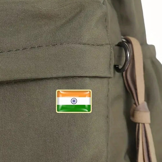 This gold-plated, enamel-filled lapel pin allows you to proudly display the India flag while honouring all those who have served or are currently serving in all theatres of war and peacekeeping efforts. Featuring the India Flag, it symbolises both national pride and remembrance. www.defenceqstore.com.au