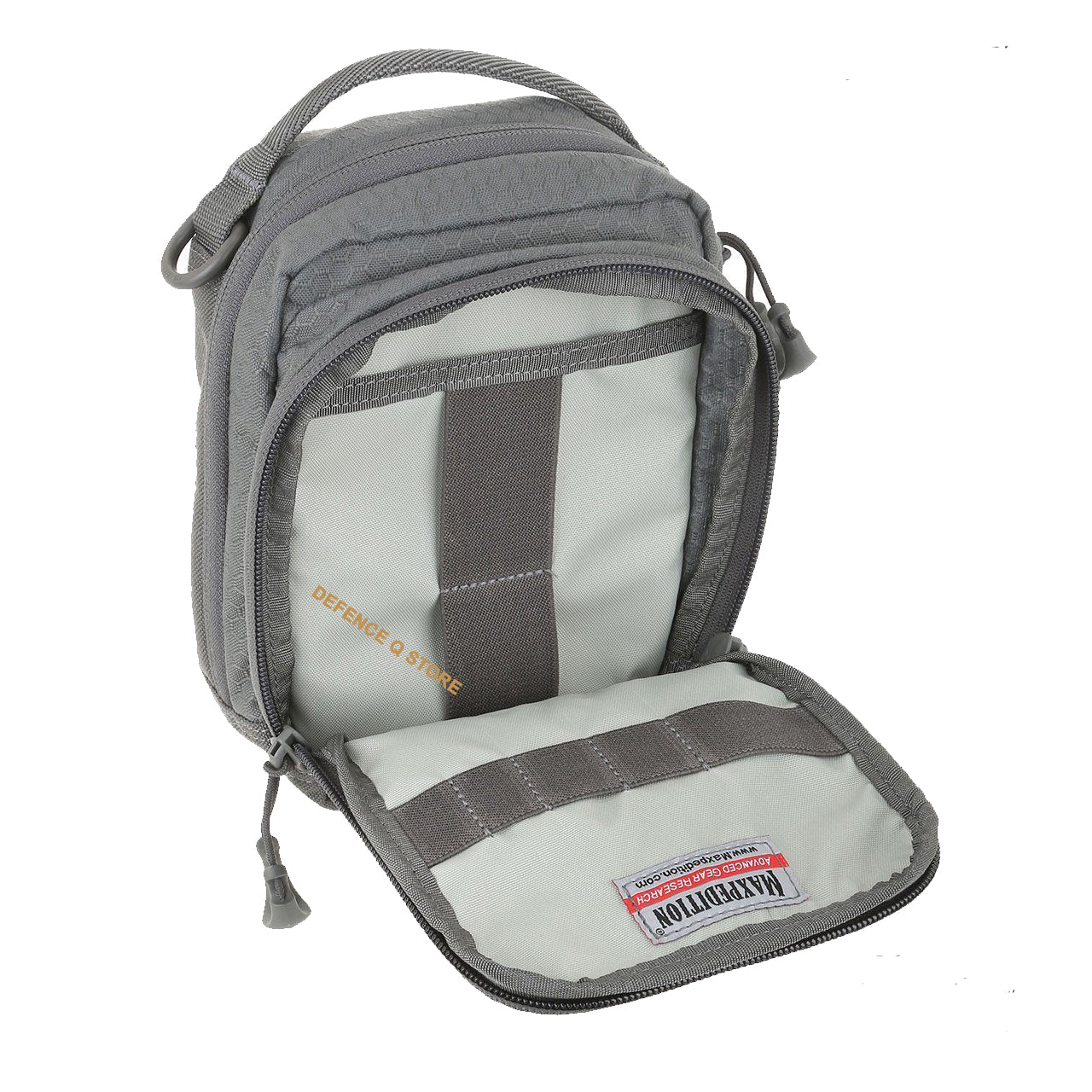 The AUP Accordion Utility Pouch is a small pouch with accordion style dividers. It has a frontal zippered compartment with elastic organization and a top carry handle made from comfortable Shapeshift webbing. www.defenceqstore.com.au