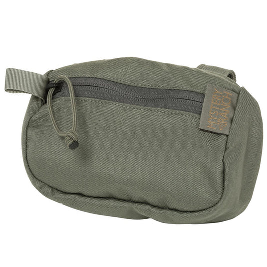 The Forager Pocket provides rapid access to essentials like food, first aid kit, GPS or headlamp and can attach to either side of any MYSTERY RANCH waistbelt. It can also be slid onto a belt or securely attached to any MOLLE system providing multiple attachment possibilities. Available in Small. www.defenceqstore.com.au