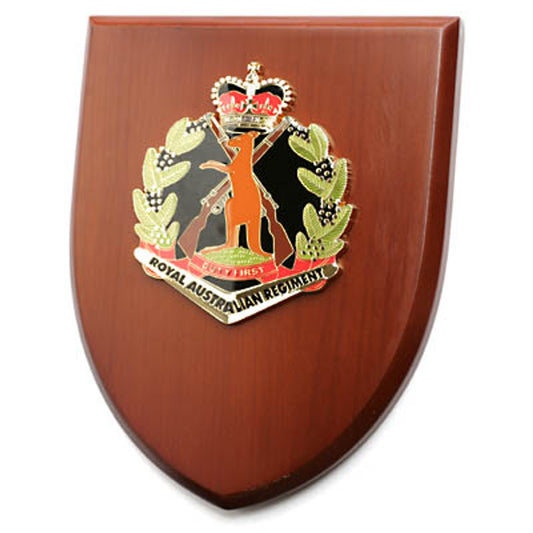 The Exceptional Royal Australian Regiment (RAR) Plaque is a truly remarkable piece that demands attention. This exquisite plaque showcases a stunning 100mm full colour enamel crest, elegantly set on a 200x160mm timber finish shield. www.defenceqstore.com.au