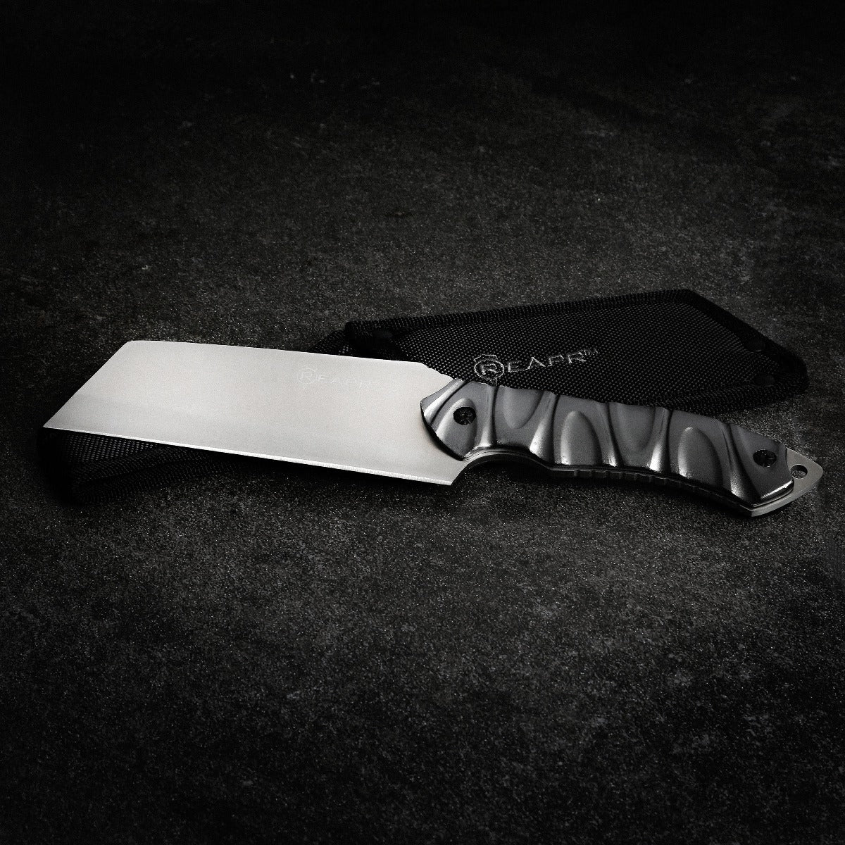 The Reapr JAMR Knife is the ultimate in versatile, tactical fixed-blade knives. The JAMR features an industry first modified cleaver blade, combining the functions of a cleaver, drop point knife and reverse tanto blade to meet a variety of demands, whether as a hunting knife, camping knife, and for guiding, tactical and survival use. www.defenceqstore.com.au