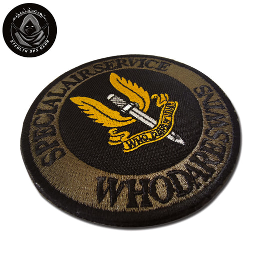 Take on new challenges and embrace the daring spirit of the SAS with "Who Dares Wins" Patch Hook & Loop. This powerful motto has been embraced by eleven elite special forces units worldwide, and now you can embody it in your own organization or project. www.defenceqstore.com.au