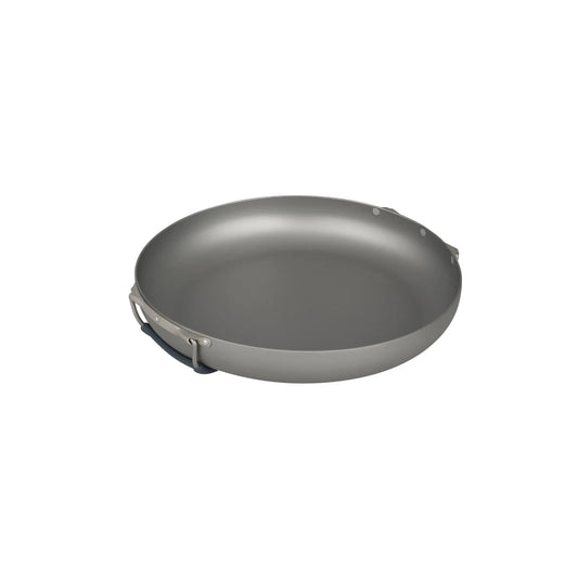 This 8-inch frypan shares the same ideals as the X-Series and fits neatly together with this nesting system. We've created a minimalist handle system that uses two silicone wrapped handles that tuck securely underneath for transportation. Using a hard-anodised 5052 aluminium, this compact pan allows the 2.8L X-Pot to friction fit neatly inside. www.defenceqstore.com.au
