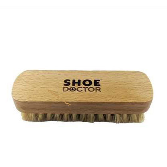 Shoe Doctor Shoe Brush with Natural Animal Bristles. Natural coloured bristles suited to any colour polish. Varnished and made from Beech Timber. This brush contains dense tufts of natural fibre bristles to provide maximum buffing! Size: 123mm x 40mm x 37mm. www.defenceqstore.com.au