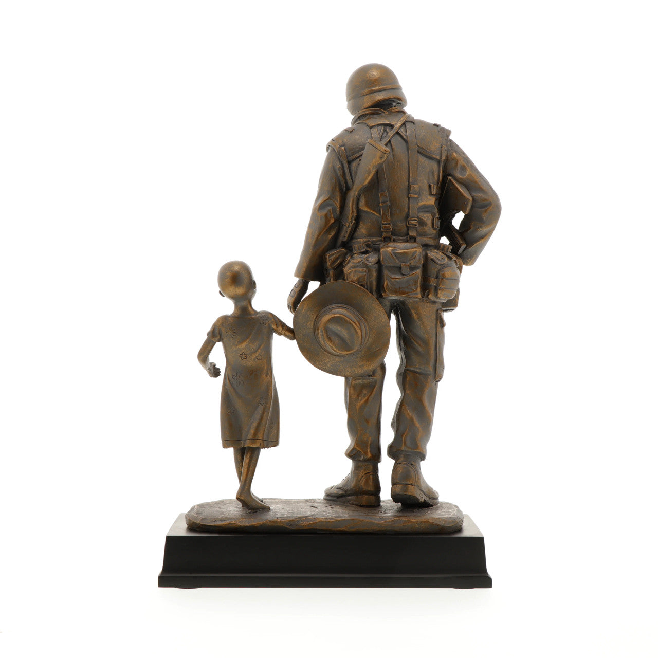 The Somalia Figurine is a sensational keepsake that pays tribute to the brave men and women who served our nation in Somalia. Inspired by Gary Ramage's iconic photograph, this figurine depicts a soldier helping a young girl, symbolizing the spirit of service and humanity. Standing at 30cm tall, this superb figurine is the perfect gift or collectable. www.defenceqstore.com.au