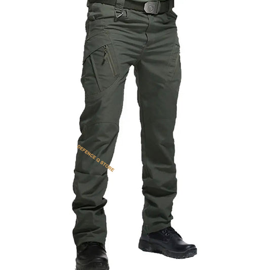 Stay comfortable and prepared during any outdoor activity or work with our Tactical Lightweight Outdoor Trousers OD Green. Featuring a zipper closure and an elastic waist for a secure fit, these trousers also have 8 convenient pockets- 2 front hand pockets, 2 back hand pockets, 2 zipper pockets, and 2 cargo pockets with hook and loop closures, perfect for carrying essentials like a knife and phone. www.defenceqstore.com.au