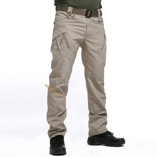 Stay comfortable and prepared during any outdoor activity or work with our Tactical Lightweight Outdoor Trousers OD Green. Featuring a zipper closure and an elastic waist for a secure fit, these trousers also have 8 convenient pockets- 2 front hand pockets, 2 back hand pockets, 2 zipper pockets, and 2 cargo pockets with hook and loop closures, perfect for carrying essentials like a knife and phone. www.defenceqstore.com.au