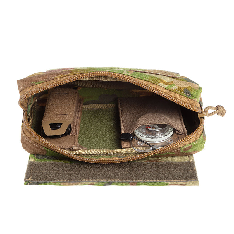 This versatile Tactical Vest Hanging Pouch AMCU serves multiple purposes - from carrying medical supplies, navigation essentials, to stowing general gear. Despite its compact size, it offers ample storage space. It can easily be attached to your vest or chest carrier thanks to its universal sandwich Hook & Loop attachment. www.defenceqstore.com.au
