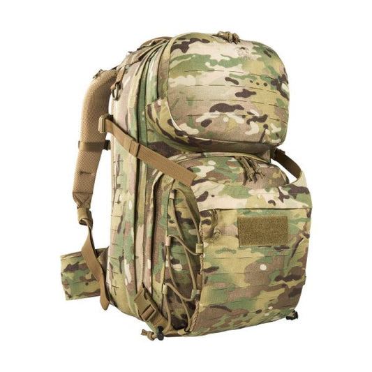 The Tasmanian Tiger Modular Radio Pack Multicam features exterior pouches and a front flap with a zippered pocket. The included removable hip belt can also double as a Warrior Belt, while the radio holder can be easily adjusted for height and width. Top zippered openings provide quick access, while the shoulder straps include cable guides and ports. www.defenceqstore.com.au