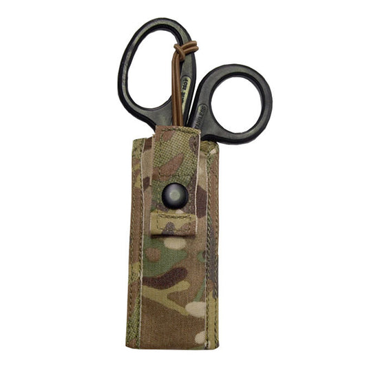 Sleek, light weight, basic and effective. Holds a single pair of medium sized trauma shears in a padded sleeve with an easy access elastic tab retention system that is easily operated with one hand. Requires one MOLLE column for attachment. When seconds count, quick access to vital tools is essential. EMT SHEARS INCLUDED IN PURCHASE. www.defenceqstore.com.au