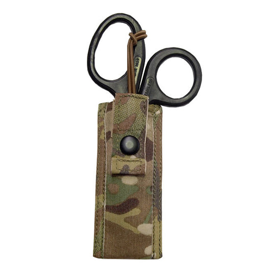 Sleek, light weight, basic and effective.  Holds a single pair of medium sized trauma shears in a padded sleeve with an easy access elastic tab retention system that is easily operated with one hand.  Requires one MOLLE column for attachment.  When seconds count, quick access to vital tools is essential.  EMT SHEARS INCLUDED IN PURCHASE. www.defenceqstore.com.au