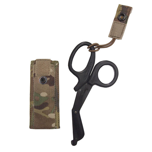 Sleek, light weight, basic and effective. Holds a single pair of medium sized trauma shears in a padded sleeve with an easy access elastic tab retention system that is easily operated with one hand. Requires one MOLLE column for attachment. When seconds count, quick access to vital tools is essential. EMT SHEARS INCLUDED IN PURCHASE. www.defenceqstore.com.au