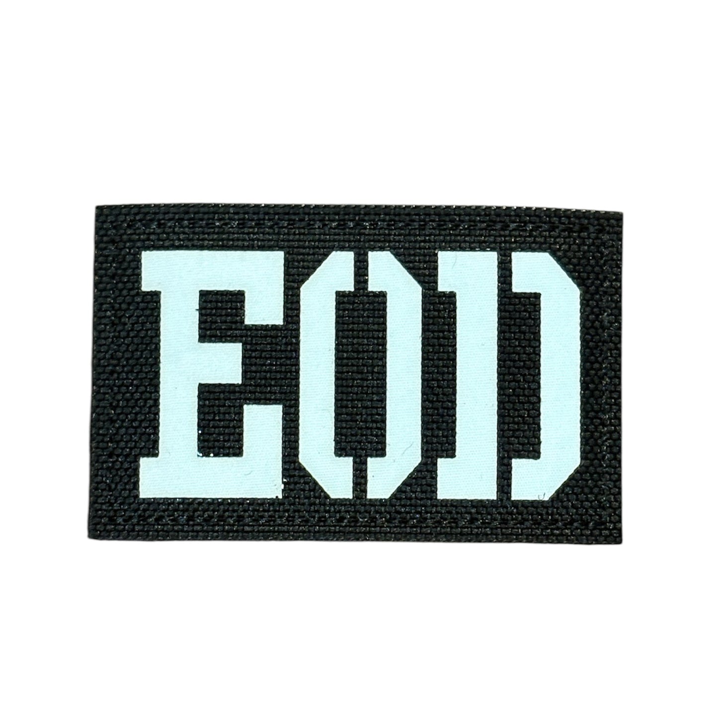 Make a bold statement with the EOD Laser Cut Black Patch. This striking 8x5cm patch features laser-cut precision detailing that demands attention. Backed with both hook and loop fasteners, it's ready to attach to tactical gear, backpacks, or uniforms instantly. www.defenceqstore.com.au