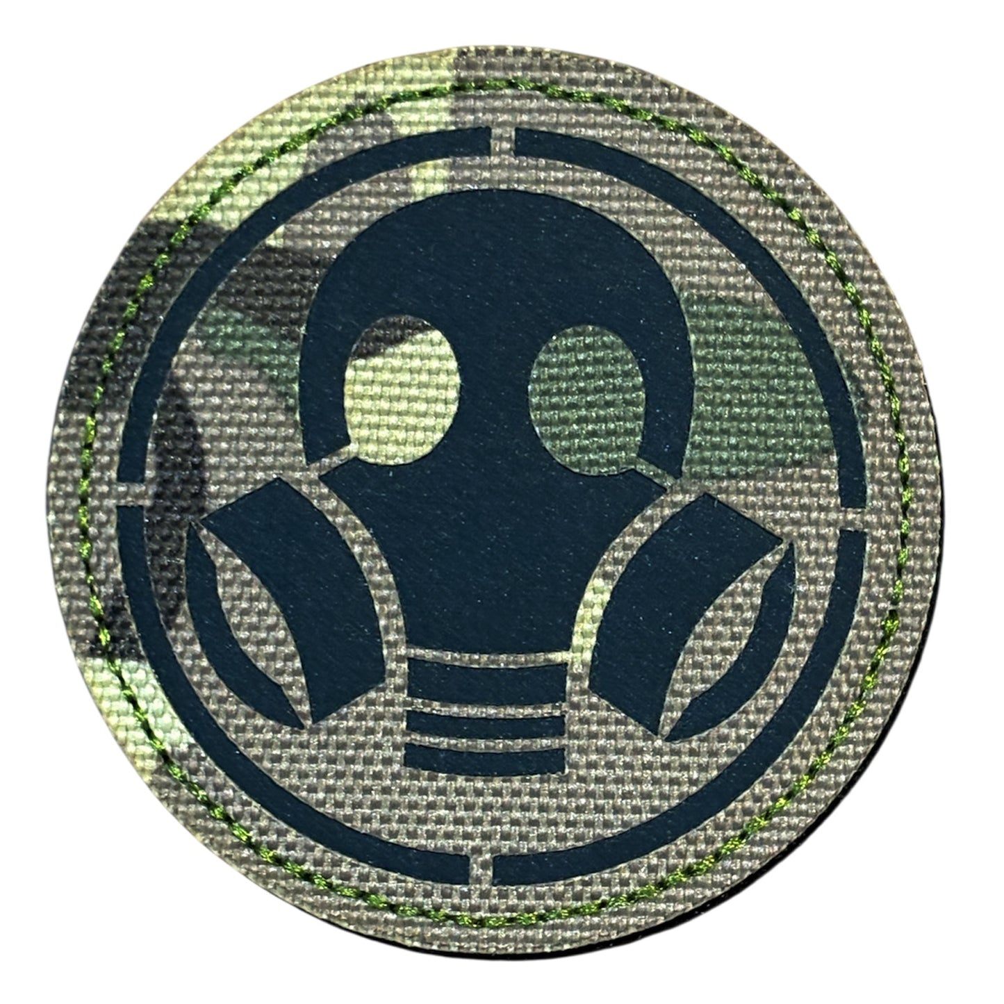 Make a bold statement with the Gas Mask Laser Cut Multicam Patch. This striking 8cm patch features laser-cut precision detailing that demands attention. Backed with both hook and loop fasteners, it's ready to attach to tactical gear, backpacks, or uniforms instantly. www.defenceqstore.com.au
