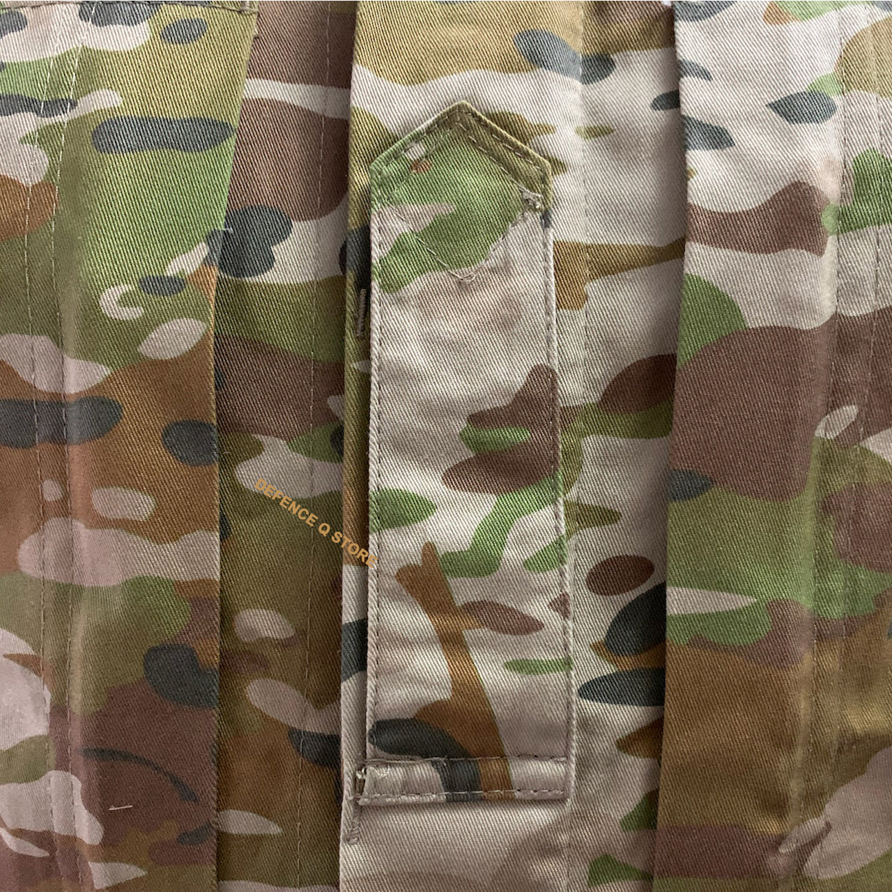 Be ready for any mission with our Army Tactical Field Shirt AMC! Made from 100% cotton, it's durable and comfortable for all day wear. With a single epaulette on the chest and buttoned shoulder pockets, you'll have easy access to necessary items. Plus, the zippered chest pockets add extra storage space. Customize your look by adding velcro patches to both arms. This shirt is a must-have for any tactical enthusiast. www.defenceqstore.com.au