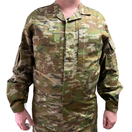 Be ready for any mission with our Army Tactical Field Shirt AMC! Made from 100% cotton, it's durable and comfortable for all day wear. With a single epaulette on the chest and buttoned shoulder pockets, you'll have easy access to necessary items. Plus, the zippered chest pockets add extra storage space. Customize your look by adding velcro patches to both arms. This shirt is a must-have for any tactical enthusiast. www.defenceqstore.com.au