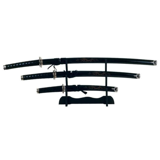 Three piece sword set with wood display stand 100cm katana sword 80cm wakizashi sword 54cm tanto sword Display stand constructed of black wood Will not ship to Victoria Please note image for illustration purposes only, no dragon design on scabbard www.defenceqstore.com.au