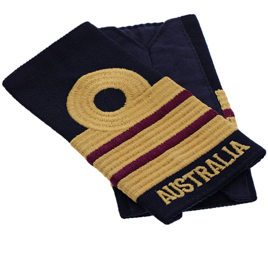 Order this quality Commander Nursing Officer Soft Rank Insignia with embroidered detailing this set of two is ready for wear. Order your set now.  Specifications:      Material: Soft rank insignia, fabric, raised embroidery     Colour: Blue, gold, maroon     Size: Standard