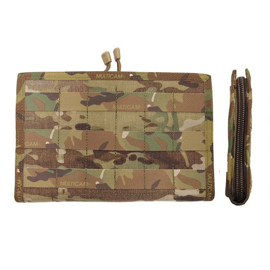 This Commander Panel allows the use of maps and other navigational items on a flat clean, protected surface. Six PALS columns wide on the front means there is sufficient space for the attachment of extra pouches. The Commander Panel also comes with a removable transparent map pouch and elastic loops to hold pens, compass, protractor etc. Specifications: Colour: Multicam Size: Large www.defenceqstore.com.au