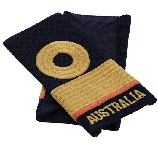 Order this quality Commodore Dental Officer Soft Rank Insignia with embroidered detailing this set of two is ready for wear. Order your set now. Specifications: Material: Soft rank insignia, fabric, raised embroidery Colour: Blue, gold, coral Size: Standard