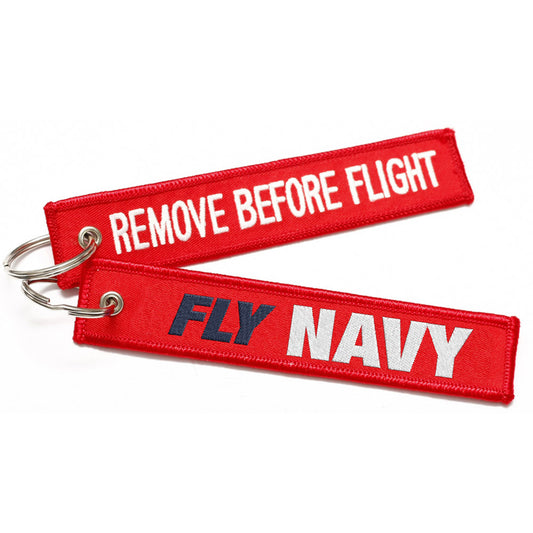 Fly Navy Remove Before Flight Tag will attach to keys and bags and bags and is a stand out connection to service. Quality woven design with swivel hook attachment.