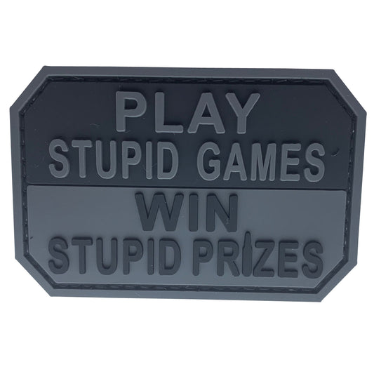Play Stupid Games PVC Patch, Velcro backed Badge. Great for attaching to your field gear, jackets, shirts, pants, jeans, hats or even create your own patch board.  Size: 7.5x5cm
