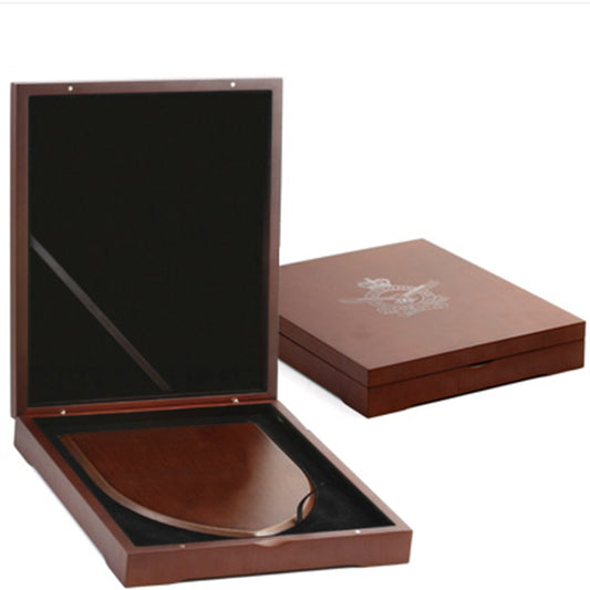 The Beautiful Air Force Plaque Presentation Box, order now and make you next presentation or gift extra special. This timber finish plaque box has a form cut black flock velvet inner base and padded flock velvet inner lid. Designed to create a quality presentation option for our range of shield plaques.  Printed with the Air Force crest on the front.  Box Size: 250mm x 210mm x 40mm www.defenceqstore.com.au