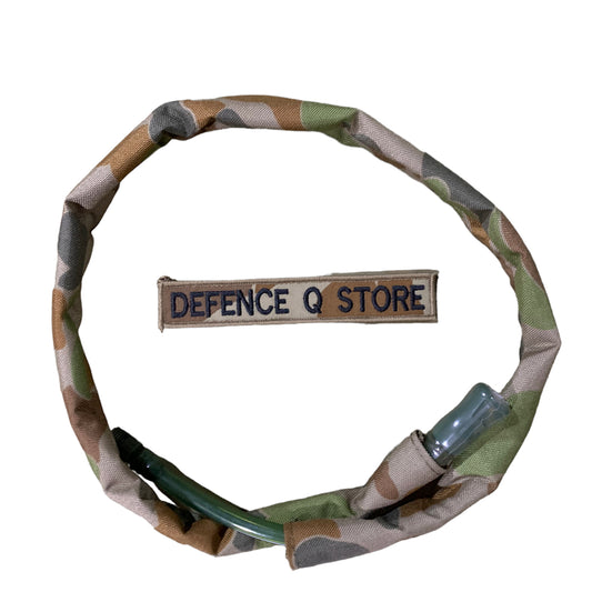 Hydration hose cover will suit your bladder backpacks and help keep your camo style up in the field. Manufactured on the Gold Coast by Defence Q Store this quality hose cover will not let you down. All the stitching has been done on the inside of the hose to give it a great quality look and feel. Length: 87cm long www.defenceqstore.com.au