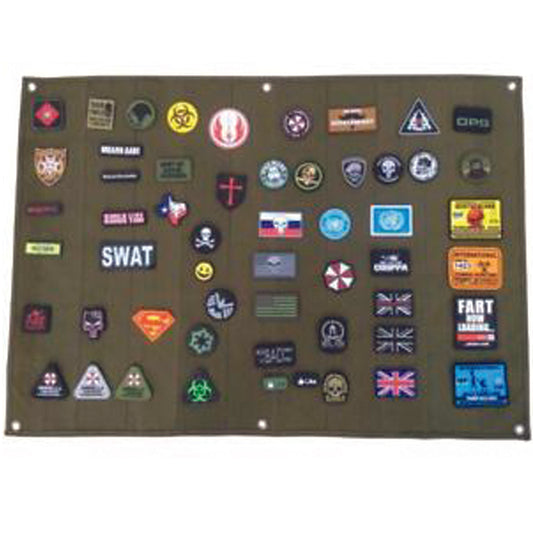 This Morale Patch Display Board with a soft loop side works with all velcro-backed morale patches, ID patches, name patch, etc. Heavy-duty grommets to hang on the wall. Folds/rolls up for easy storage. Heavy-duty nylon fabric backing.  Size: 80 x 60 cm.  Can fit up to 100 patches, will depend on the size of the patches you have  Note: Patches not included