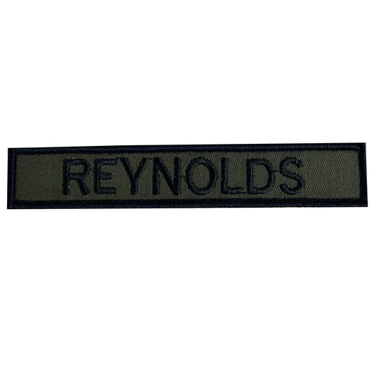Please put the name in the comments section at checkout or email sales@moralepatches.com.au.  Don't worry, if you forget we will email you.  Name tag in Olive material, size is 2.5cm x 15cm, lettering is 1.5cm in height.  All embroidery is done in upper case letters only as a FYI.  These are great for cadets, airsoft or even survivalists who love their uniforms.  Don't forget you can even add the velcro backing and use them on your field gear or even dog vests.