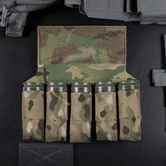 Transform your tactical vest or plate carrier into a versatile and efficient equipment with our 40MM Elite Tactical Vest Adaptor Panel in Multicam. Easily store up to 5 40mm grenades for quick and easy access in any mission or training. This must-have accessory is compatible with most tactical vests and plate carriers, making it the perfect addition to your gear. Elevate your performance and be prepared for any situation. www.defenceqstore.com.au