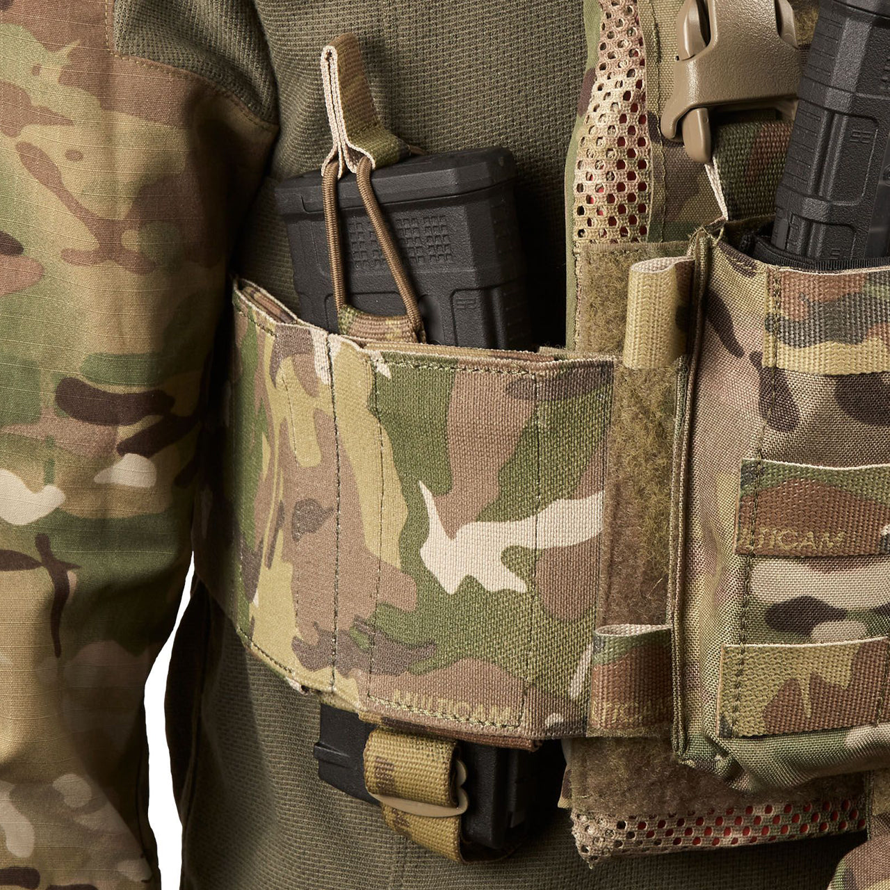 The ASAD Elastic Side Wings are designed to attach to the front or back Velcro area of your plate carrier under your cummerbund to boost carrying capacity without adding weight, they will accept various radios, up to two M4 magazines, a smoke grenade, medical items or similar sized objects. www.defenceqstore.com.au wing with magazine