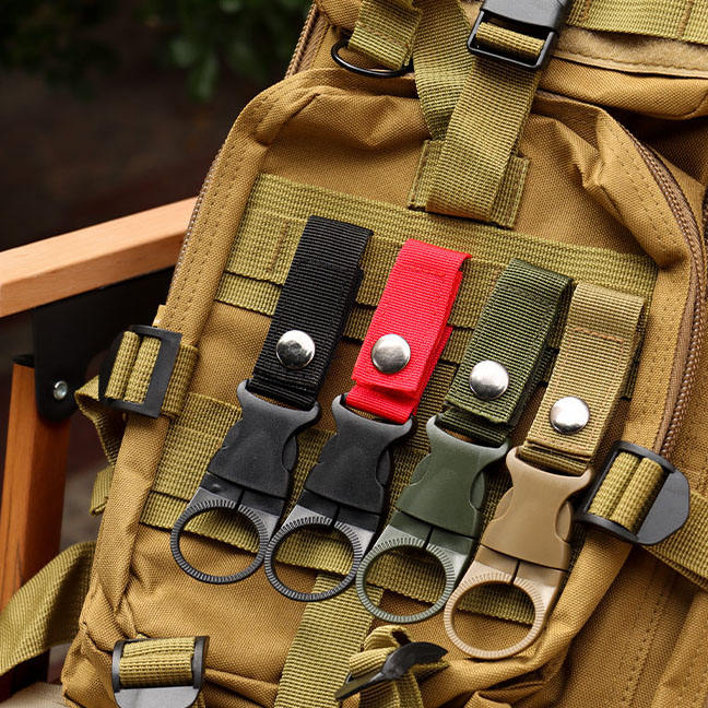Stay hydrated without breaking stride. This versatile water bottle holder clips securely to your belt, MOLLE webbing, pack, or vest—keeping your drink within arm's reach during missions, training, hikes, or hunts. The quick-release system lets you grab a drink in seconds, no fumbling required. www.defenceqstore.com.au