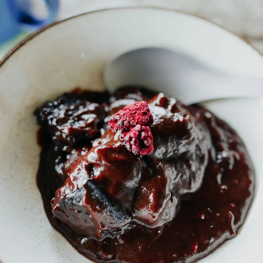 Our take on chocolate self-saucing pudding, with chocolate brownie, boysenberries and chocolate sauce. www.defenceqstore.com.au