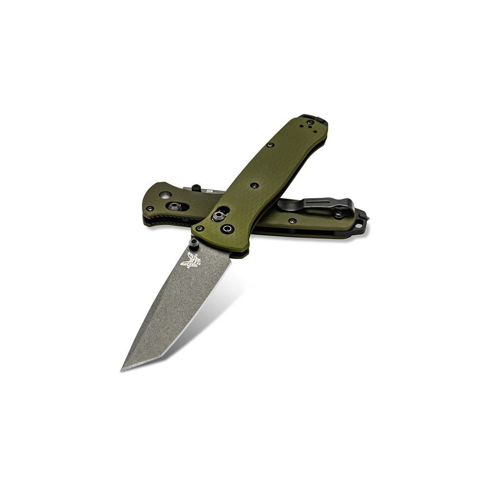 Upgrade your folding knife game with the powerful 537GY-1 Bailout. Boasting a slim profile but built with strong CPM-M4 steel and woodland green aluminum handles, this knife is the ultimate lightweight powerhouse. Plus, the carbide glass breaker on the pommel adds an extra layer of versatility. www.defenceqstore.com.au