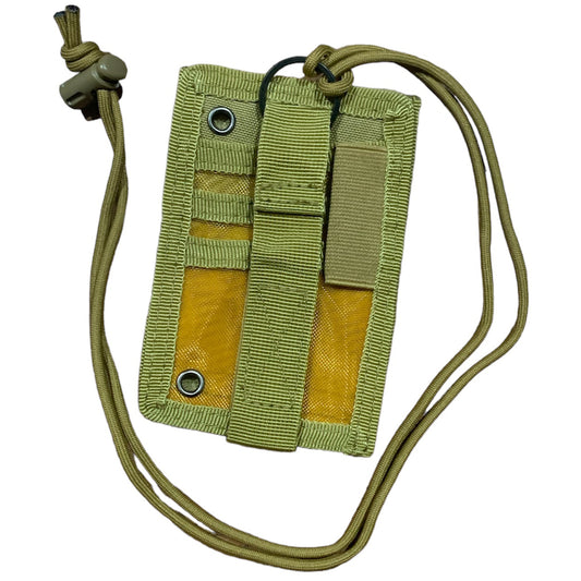 Elevate your tactical gear with the Elite Tactical MOLLE Capable ID Holder in Coyote. Its convenient front ID window and MOLLE compatibility make it the perfect accessory for attaching to your equipment or wearing around your neck. With space for a pen and three separate card slots in the back, this holder offers added security for your valuables. The tear away front ID holder and included paracord with toggle add a rugged and functional touch. www.defenceqstore.com.au