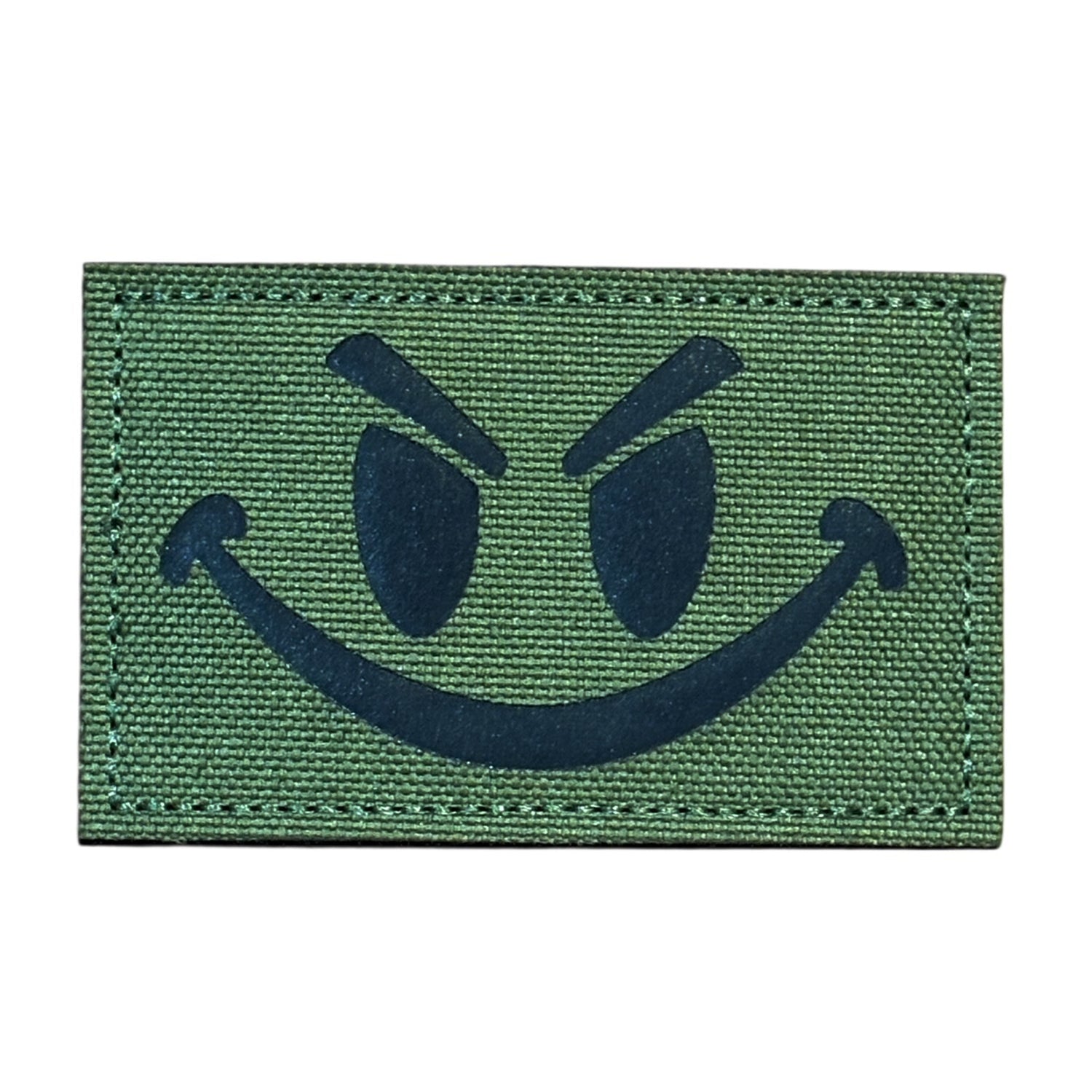 Make a bold statement with the Evil Smile Laser Cut Tan Patch. This striking 8x5cm patch features laser-cut precision detailing that demands attention. Backed with both hook and loop fasteners, it's ready to attach to tactical gear, backpacks, or uniforms instantly.  www.defenceqstore.com.au