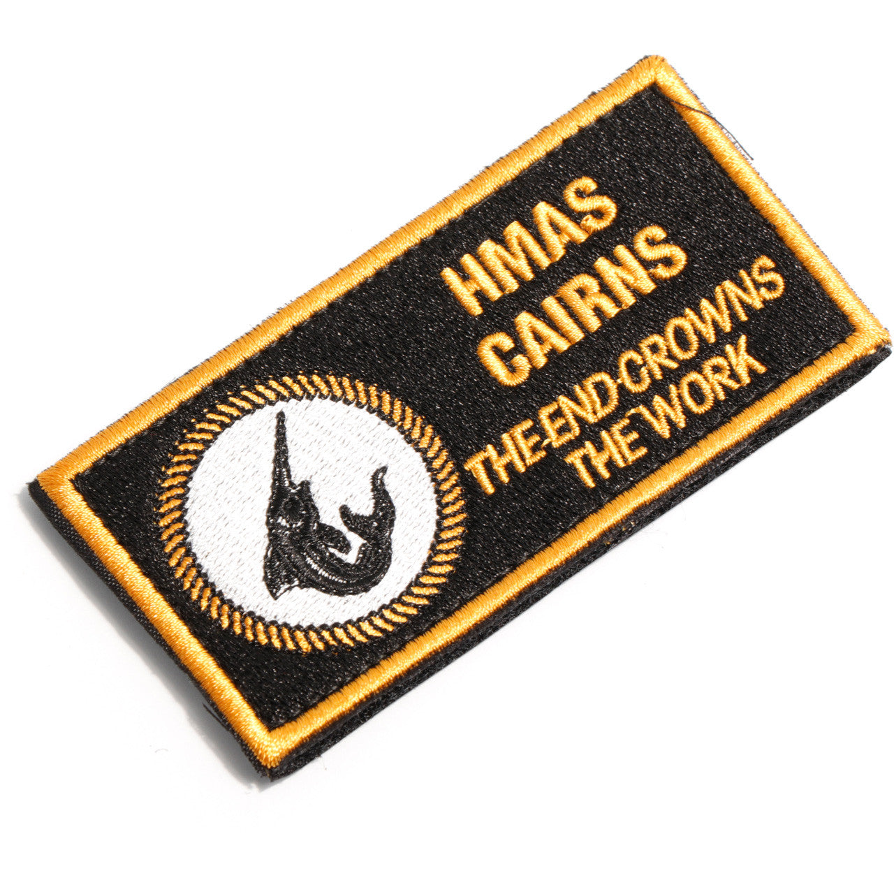 The HMAS Cairns DPNU Patch is a must-have for all military enthusiasts. This embroidered patch features the iconic HMAS Cairns logo in black and yellow, adding a touch of style to any outfit or accessory. With its convenient hook-and-loop backing, it can be easily attached to clothing, bags, or hats. Show your support for the HMAS Cairns with this high-quality patch. www.defenceqstore.com.au